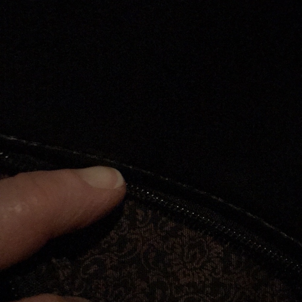 Black crossbody with textured front and front zipper and zipper top - Picture 3 of 4